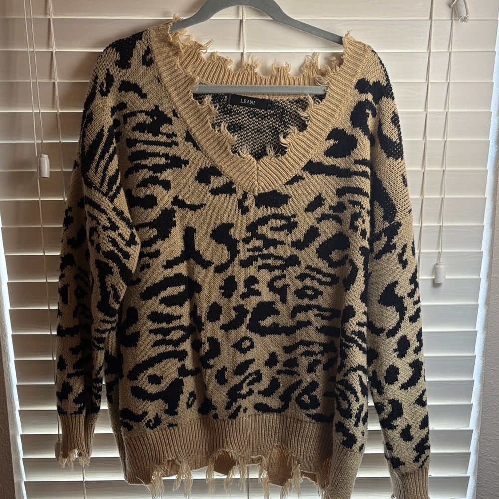 Women's V-Neck Distressed Cheetah Sweater - Black and Tan